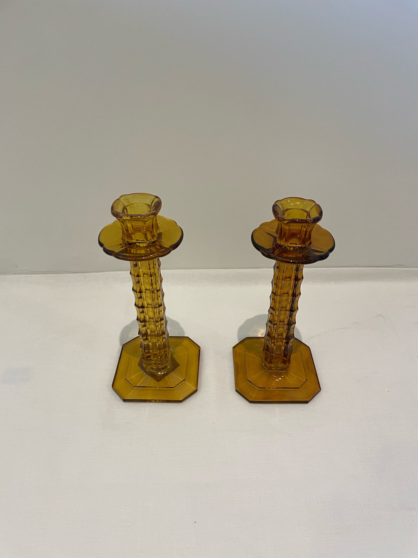 Pair of Amber Glass Candlesticks